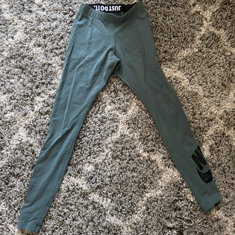 Green Nike Leggings with Nike Sign and Swoosh on leg!